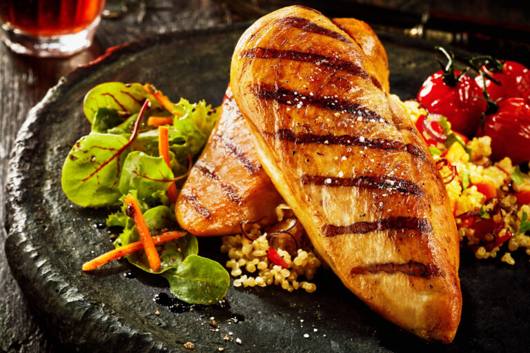 Grilled chicken breast with couscous and vegetables